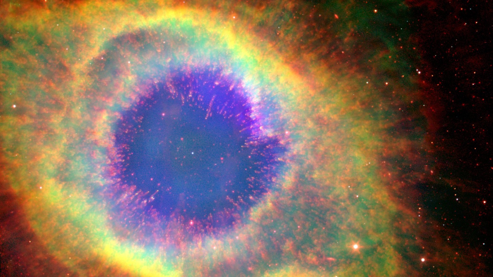 Der Helixnebel NGC 7293 im Sternbild Wassermann, aufgenommen von Spitzer und GALEX